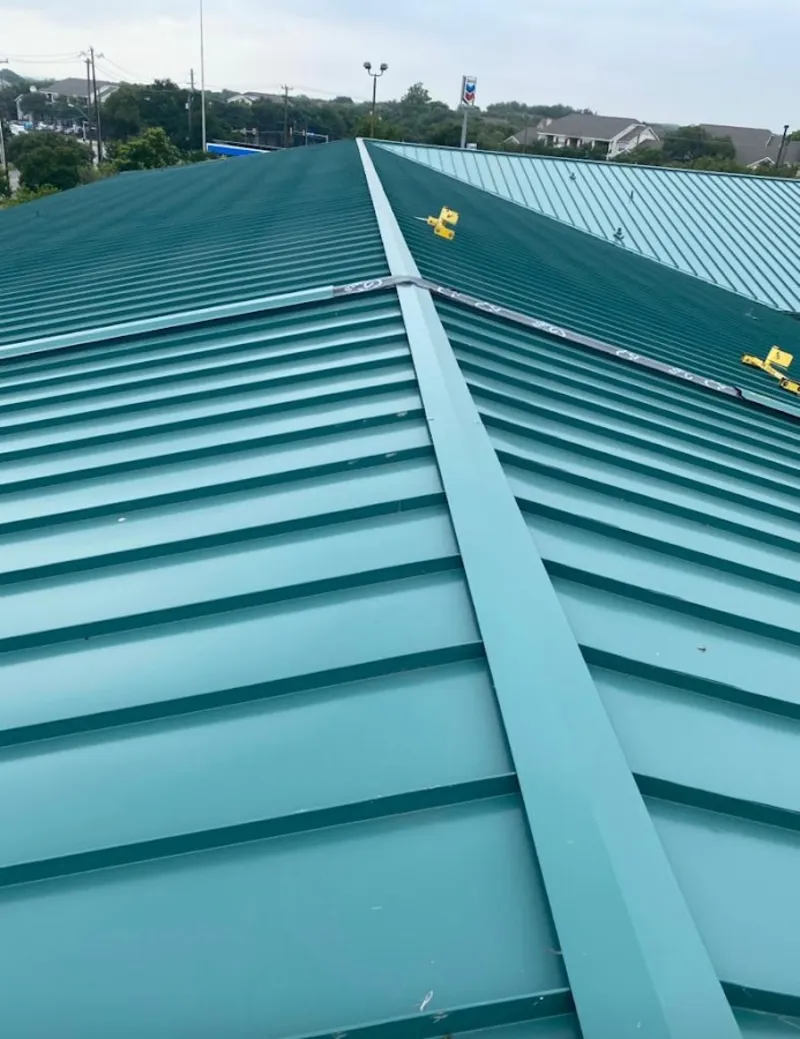 Green commercial metal roof ridge and valley for Metal Roof Repair in Texas