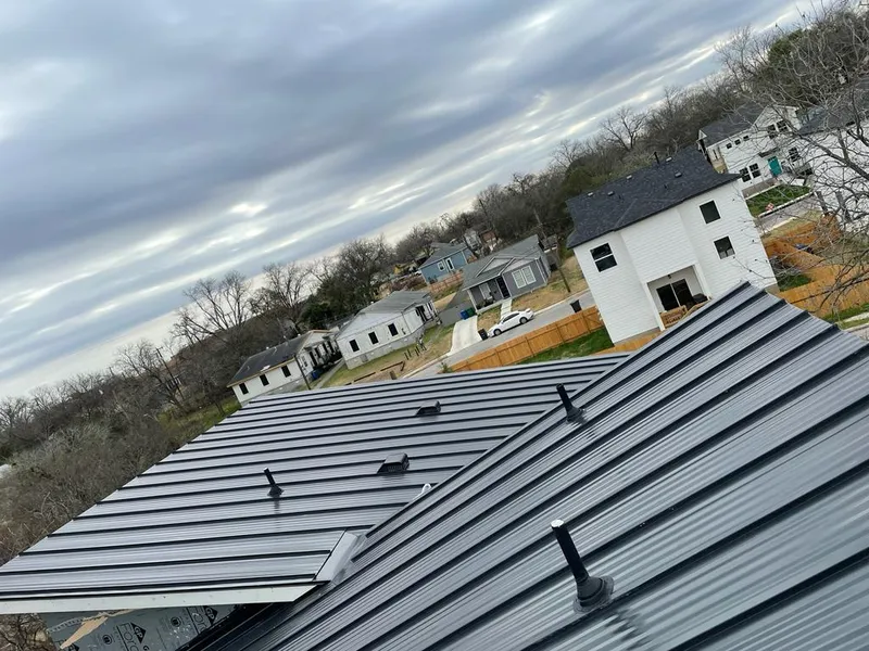 Standing seam metal roof panels with vents for Skylight Repair in Texas